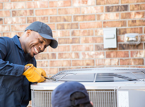 man working on air conditioner